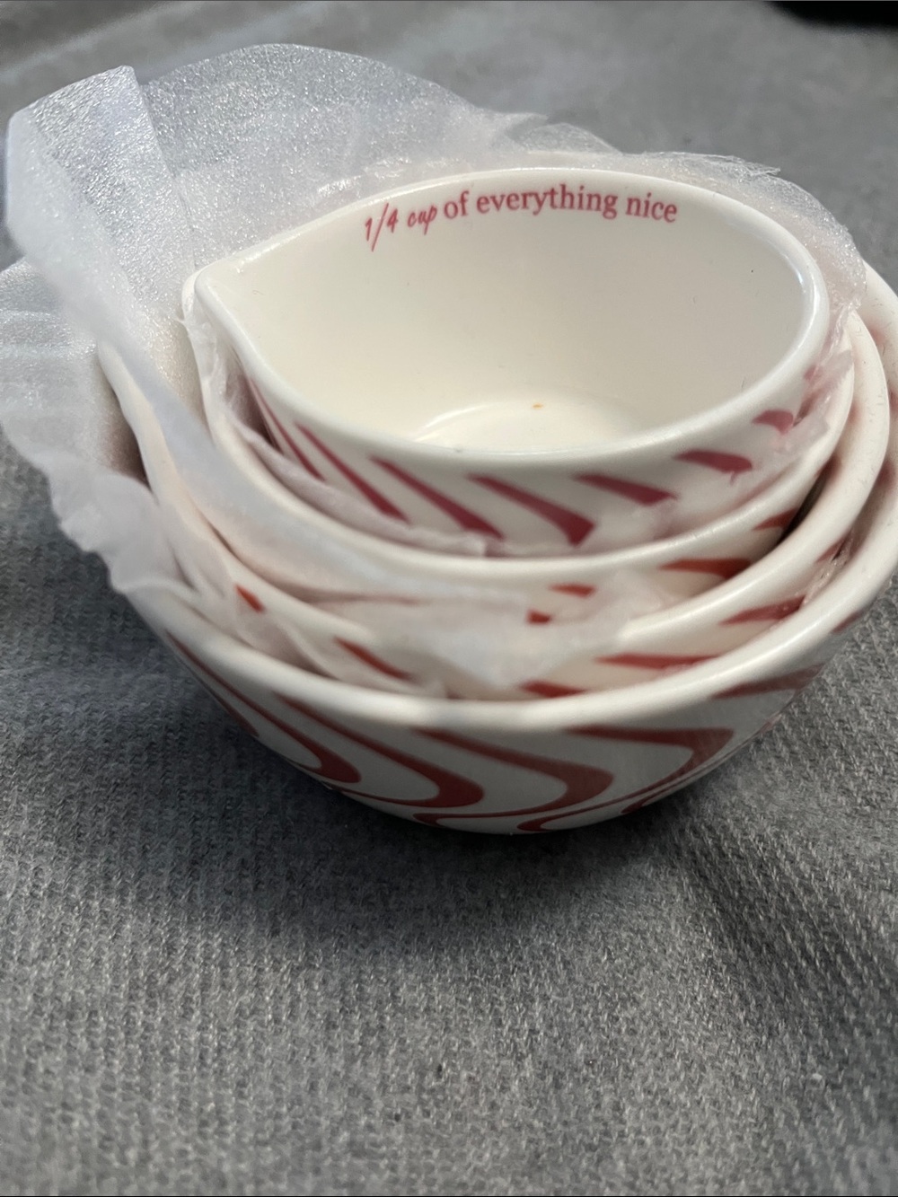 Festive White Ceramic Measuring Cups with Red Swirl Accent